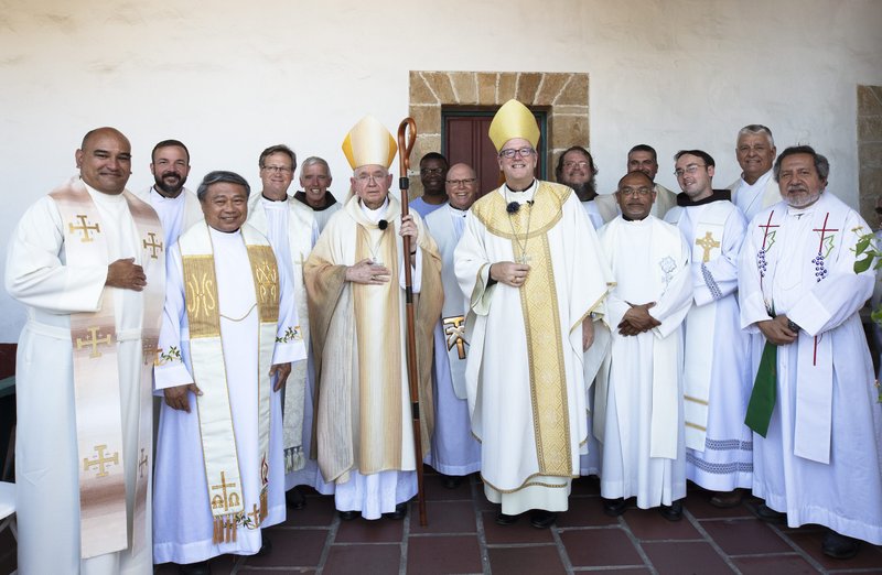 Archbishop José H. Gomez and Bishop Barron pose for pictures following a farewell Mass of Thanksgiving July 10 at the Santa Barbara Mission. (Victor Alemán)