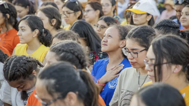 Young Catholics praying on the Mount of Beatitudes, July 19, 2022. (Courtesy Neocatechumenal Way via CNA)
