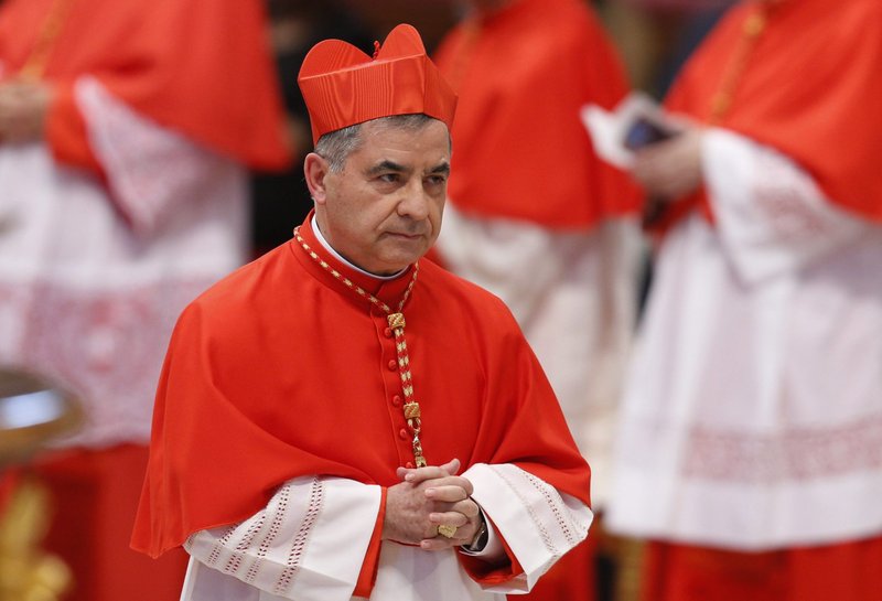 Cardinal Angelo Becciu is pictured after being made a cardinal by Pope Francis during a consistory in St. Peter's Basilica at the Vatican in this June 28, 2018, file photo. According to a report published Aug. 22 by the Italian newspaper L'Unione Sarda, Cardinal Angelo Becciu told participants at a private Mass that Pope Francis intends to reinstate his rights and privileges as a cardinal. (CNS photo/Paul Haring)