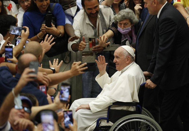 Pope Francis greets the crowd as he leaves his general audience in the Paul VI hall at the Vatican Aug. 3, 2022. (CNS photo/Paul Haring)