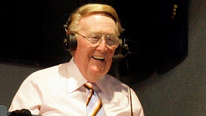 Legendary Los Angeles Dodgers announcer Vin Scully smiles in a broadcast booth during the National League MLB baseball game between the San Francisco Giants and the Los Angeles Dodgers in Los Angeles, April 25, 2007. Scully died Aug. 2, 2022, at age 94. In 2016, he received the Gabriel Personal Achievement Award from the Catholic Academy of Communication Professionals at the Catholic Media Conference in St. Louis. (CNS photo/Danny Moloshok, Reuters)