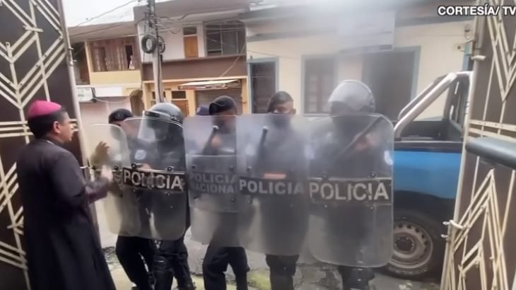 Bishop Rolando José Álvarez of Matagalpa, Nicaragua, is pictured in a screenshot from video at his residence in Matagalpa as riot police block the door. The bishop said the police were preventing him, six priests and six laypeople from leaving the local diocesan offices. (CNS screenshot/YouTube)