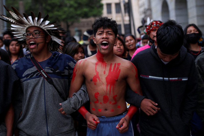 Guarani Indigenous people protest as they mark the International Day of the World's Indigenous Peoples in São Paulo Aug. 9, 2022. The Brazilian bishops' Indigenous Missionary Council said record violence last year against traditional peoples may have made 2021 "the worst year of the century" for Indigenous peoples. (CNS photo/Amanda Perobelli, Reuters)
