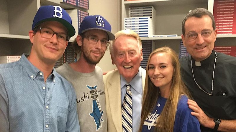 Left to right: J.P. Kaser, Kevin Brennan, Vin Scully, Amy Brennan, Bishop Joseph V. Brennan, at a Dodgers game in 2016. (Courtesy Robert Brennan)