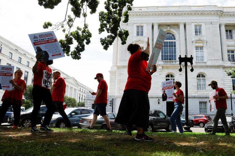 Union workers march for a new labor contract on Capitol Hill in Washington Aug. 2, 2022. (CNS photo/Jonathan Ernst, Reuters)