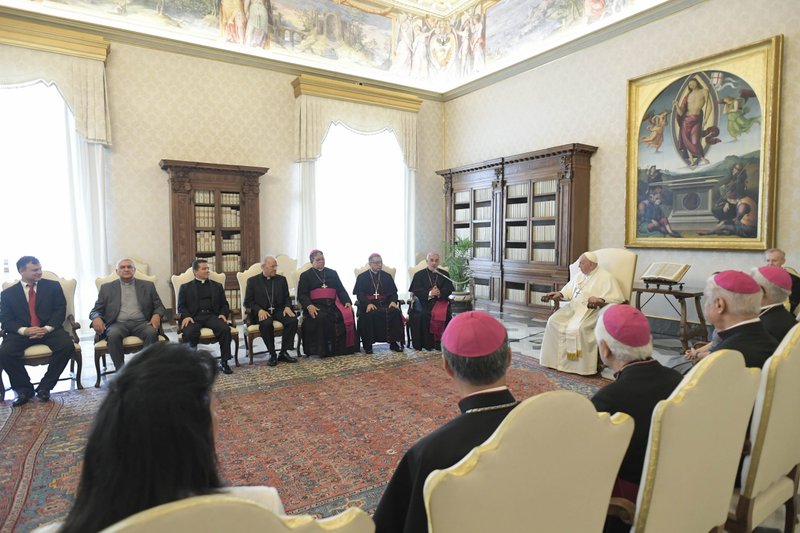 Pope Francis listens as Archbishop Javier Del Río Alba of Arequipa, Peru, president of the administrative council of the Populorum Progressio Foundation for Latin America and the Caribbean, speaks during a meeting with the council in the library of the Apostolic Palace at the Vatican Sept. 16, 2022. (CNS photo/Vatican)