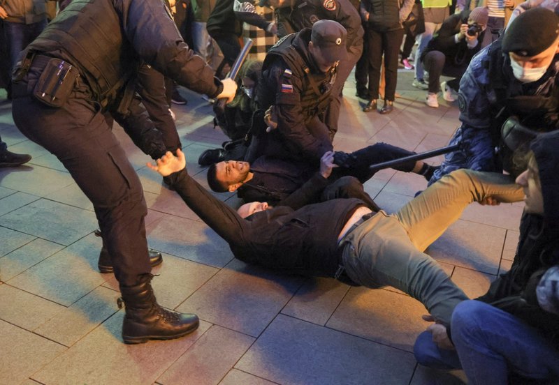 Russian police officers detain men during an unsanctioned rally in Moscow protesting President Vladimir Putin's announced mobilization of reservists in the Russia-Ukraine war Sept. 21, 2022. (CNS photo/Reuters)