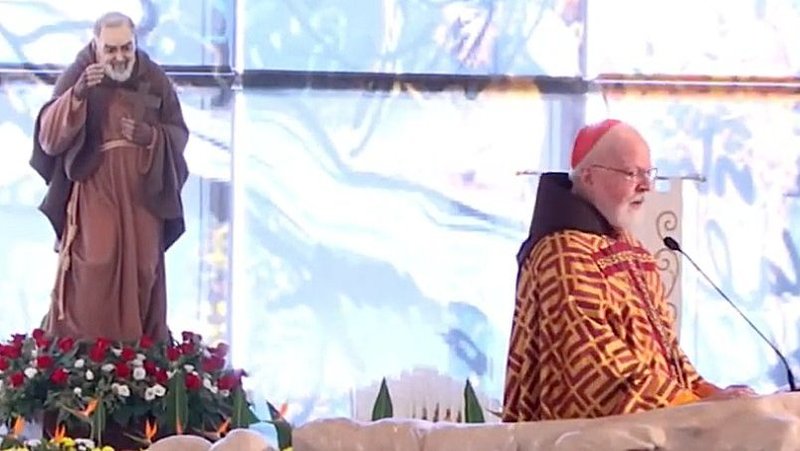 Boston Cardinal Seán P. O'Malley speaks near a statue of St. Padre Pio during a Mass at the Shrine of St. Pio of Pietrelcina in San Giovanni Rotondo, Italy, Sept. 23, 2022. Padre Pio was a dedicated confessor who is said to have had the stigmata, wounds on his feet, hands and side corresponding to those Jesus suffered at the crucifixion. (CNS screenshot/YouTube)