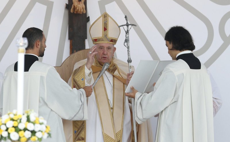 Pope Francis gives his blessing after celebrating the closing Mass of Italy's National Eucharistic Congress at the municipal stadium in Matera, Italy, Sept. 25, 2022. (CNS photo/Paul Haring)
