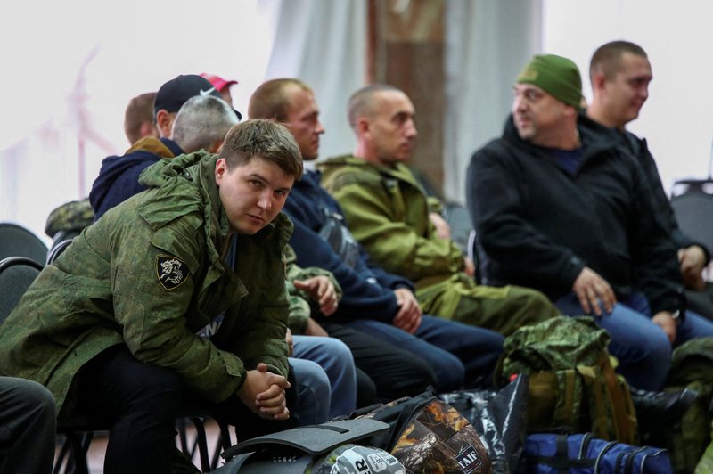 Russian reservists meet at a gathering point in the course of partial mobilization of troops in Volzhsky Sept. 28, 2022. Russia's Catholic bishops said the government must recognize a right to conscientious objection and accept the "absolute impossibility" of drafting Catholic clergy. (CNS photo/Reuters)
