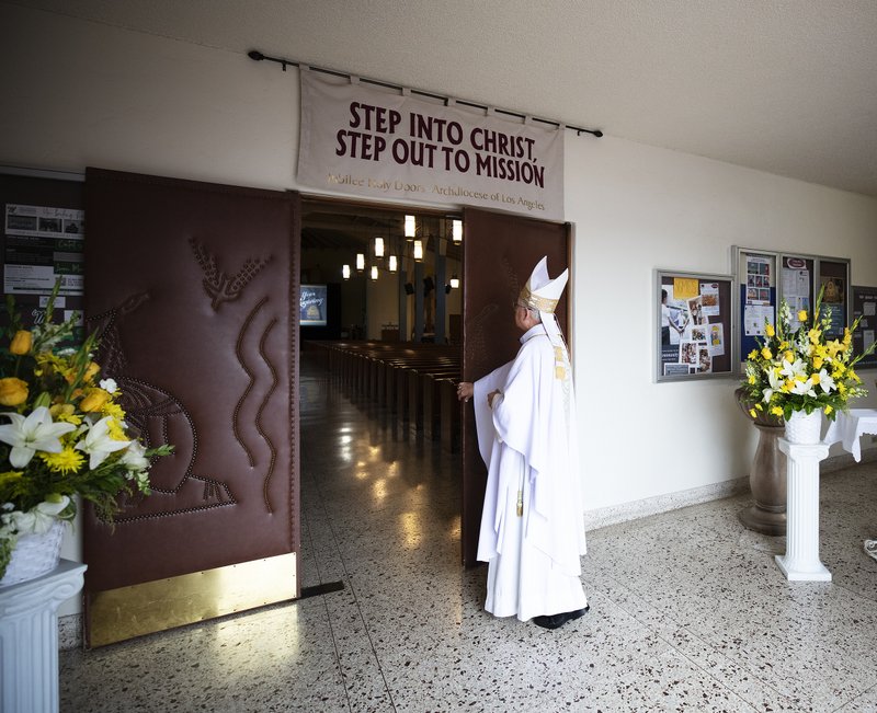 Archbishop Gomez closed the jubilee year Holy Door at the Chapel of the Annunciation, the larger, newer church on the mission grounds.(Victor Alemán)