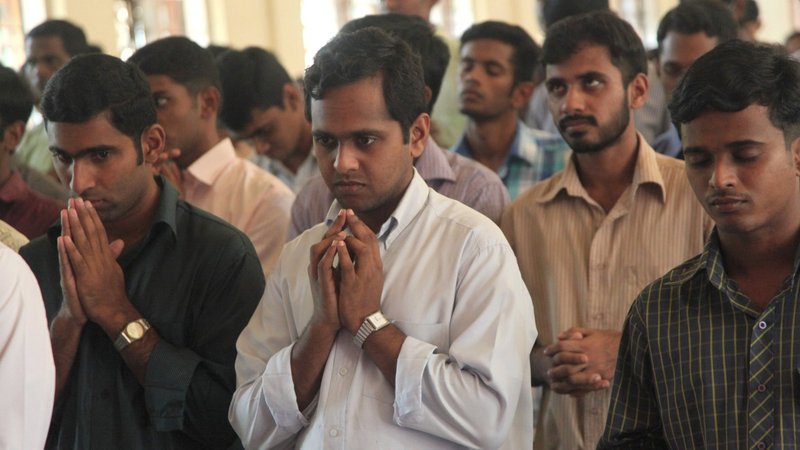 Seminarians are pictured in a file photo praying at St. Joseph Pontifical Seminary of the Syro-Malabar Catholic Church in India's Kerala state. Lay leaders in the Kochi-based Ernakulam-Angamaly Archdiocese say Archbishop Andrews Thazhath, the apostolic administrator, unilaterally revoked the dispensation that had allowed priests to celebrate Mass facing the people, reported ucanews.com. (CNS photo/Msgr. John E. Kozar, courtesy of CNEWA)
