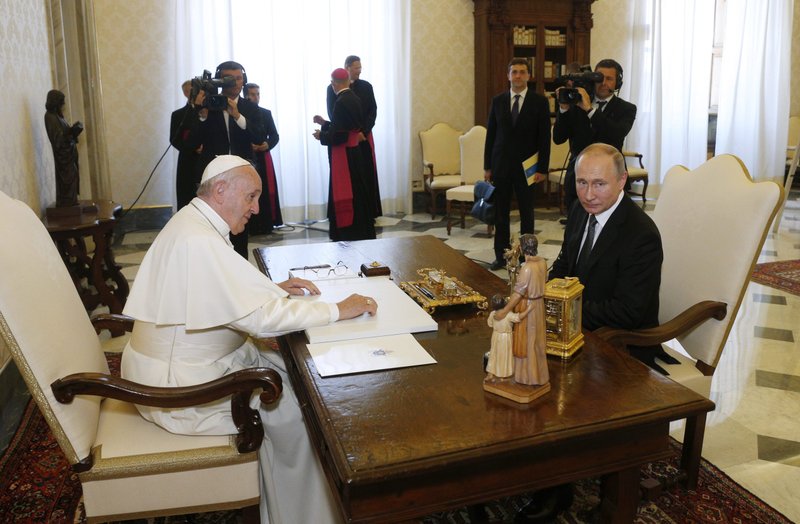 Pope Francis meets Russian President Vladimir Putin during a private audience at the Vatican in this July 4, 2019, file photo. (CNS photo/Paul Haring)