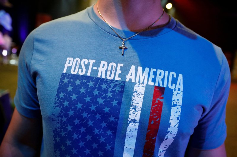 A student wears a crucifix and a pro-life T-shirt during a July 22, 2022, Turning Point USA Student Action Summit (SAS) in Tampa, Fla. (CNS photo/Marco Bello, Reuters)