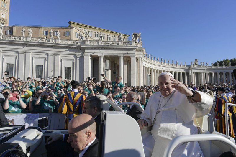 Pope Francis greets the crowd during his general audience in St. Peter's Square at the Vatican Oct. 5, 2022. (CNS photo/Vatican Media)