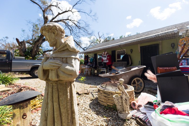 A statue of St. Francis of Assisi remains standing outside the Fort Myers, Fla., home of Elizabeth Reyes, an art instructor, and her husband, Luis Reyes, an employee of Catholic Charities of the Diocese of Venice, Oct 5, 2022. Hurricane Ian brought at least 3 inches of rain into the Reyes family residence Sept. 28 and caused tree to fall and pull a power line from the home. (CNS photo/Tom Tracy)