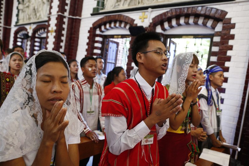 Young people pray as Pope Francis celebrates Mass at St. Mary's Cathedral in Yangon, Myanmar, Nov. 30, 2017. The Federation of Asian Bishops' Conferences must restructure itself to make the church "relevant and responsive" to the people of Asia, a top-ranking cardinal said. (CNS photo/Paul Haring)