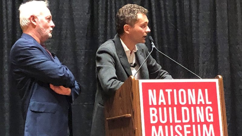 Philippe Villeneuve and Rémi Fromont, the chief architects leading the restoration of Notre-Dame Cathedral in Paris after the 2019 fire, speak Sept. 26, 2022, at the National Building Museum in Washington. (CNS photo/Mark Zimmermann, Catholic Standard)