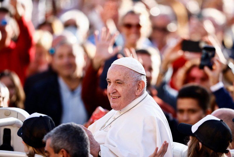 Pope Francis smiles during his general audience in St. Peter's Square at the Vatican Oct. 19, 2022. (CNS photo/Yara Nardi, Reuters)