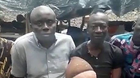 This is a screenshot from video showing some of people who were abducted by separatists in Cameroon, all of whom have since been freed. All nine, including clergy, were seized Sept. 16, 2022, when 60 attackers destroyed St. Mary's Catholic Church in the southwestern village of Nchang, close to the Nigerian border. (CNS screenshot Cameroon News Agency)