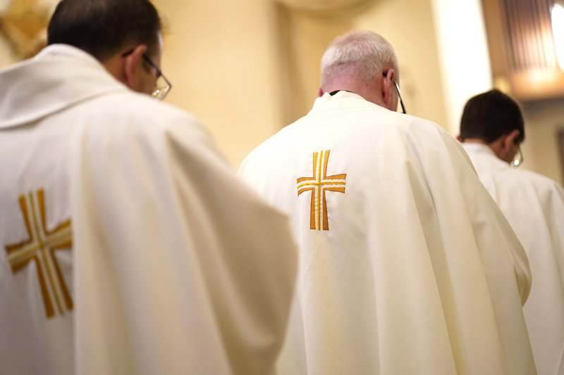 Priests are seen during a special Mass for vocations in Merrick, N.Y., Aug. 4, 2022. (CNS photo/Gregory A. Shemitz)