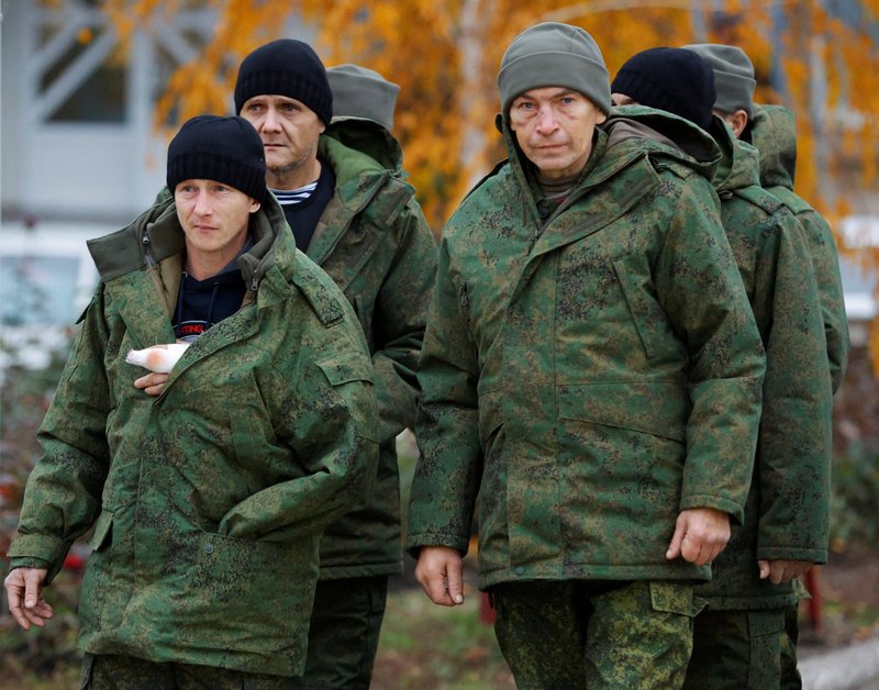 Servicemen released in a recent Russia-Ukraine prisoner exchange arrive in Amvrosiivka, Ukraine, Nov. 6, 2022. Aleksandr Avdeyev, Russian ambassador to the Holy See, confirmed that Pope Francis helped facilitate recent prisoner exchanges with Ukraine and said the Vatican is ready to act as a mediator between Ukraine and Russia. (CNS photo/Alexander Ermochenko, Reuters)