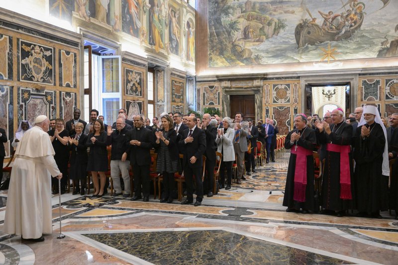 Members, consultants and staff of the Vatican Dicastery for Communication applaud Pope Francis during an audience Nov. 12, 2022, in the Clementine Hall of the Apostolic Palace at the Vatican. (CNS photo/Vatican Media)