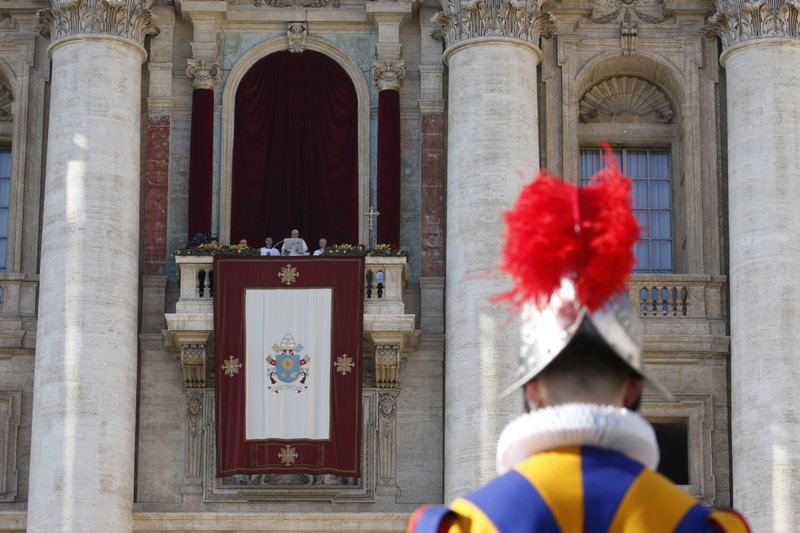 Pope Francis speaks as he leads his Christmas message and his blessing "urbi et orbi" (to the city and the world) from the central balcony of St. Peter's Basilica at the Vatican Dec. 25, 2022. (CNS photo/Paul Haring)