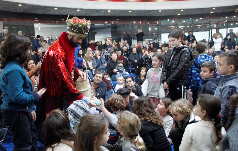 One of the three Wise Men distributes gifts to Israeli children at an Epiphany celebration in January 2020 at the Domus Galilaeae, an international retreat center on the Mount of Beatitudes. (Domus Galilaeae)