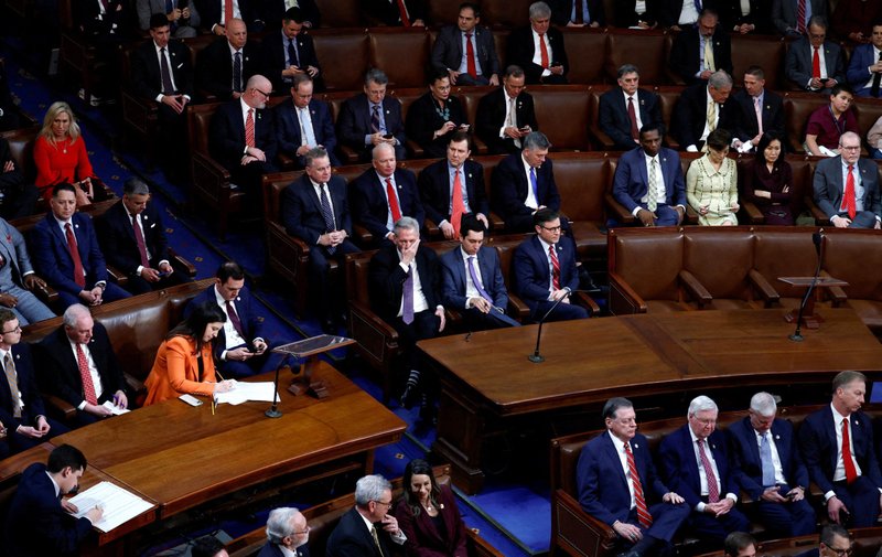 House Majority Leader Kevin McCarthy, R-Calif., puts his hand to his face as he sits among his House colleagues as a fourth round of voting for a new House Speaker begins on the second day of the 118th Congress at the U.S. Capitol in Washington Jan, 4, 2023. (OSV Photo/Evelyn Hockstein. Reuters)