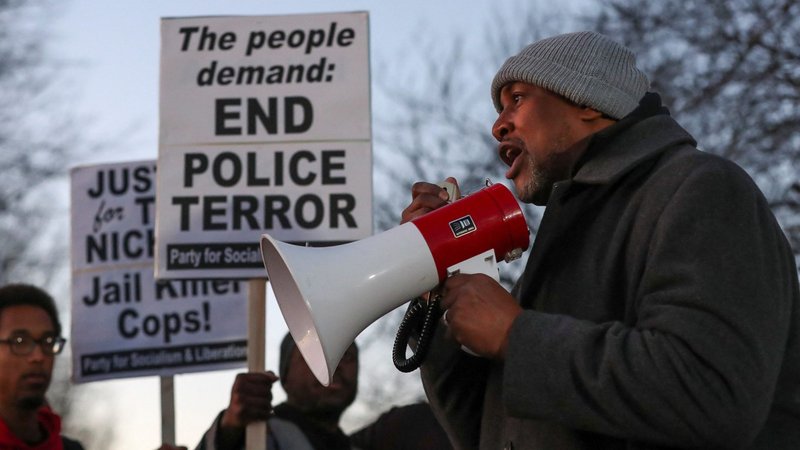 A man speaks through a bullhorn during a protest in Memphis, Tenn., Jan. 27, 2023, on the day of the release of the video showing police officers beating Tyre Nichols, the young Black man who was killed as a result of a traffic stop by Memphis police officers. (OSV News photo/Alyssa Pointer, Reuters)