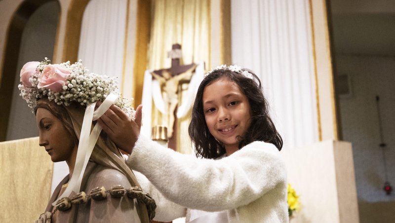 Samantha Valencia, a first-grader at St. Dorothy School in Glendora, participated in her school's May Crowning event May 5. (Victor Alemán)