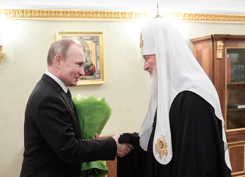 Russian President Vladimir Putin congratulates Russian Orthodox Patriarch Kirill of Moscow on the day of the 11th anniversary of his enthronement, in Moscow in this Feb. 1, 2020, file photo.(CNS/Sputnik/Alexei Druzhinin/Kremlin via Reuters)