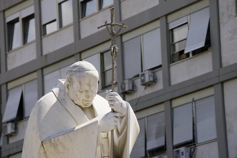 A statue of St. John Paul II is seen outside of Rome's Gemelli hospital June 8, 2023, where Pope Francis is staying after undergoing surgery to treat a hernia June 7. Because of his frequent visits over his three-decade pontificate, the Polish pope affectionately called the hospital "the third Vatican" after his second "home" at the papal summer residence in Castel Gandolfo outside of Rome. (CNS/Justin McLellan)