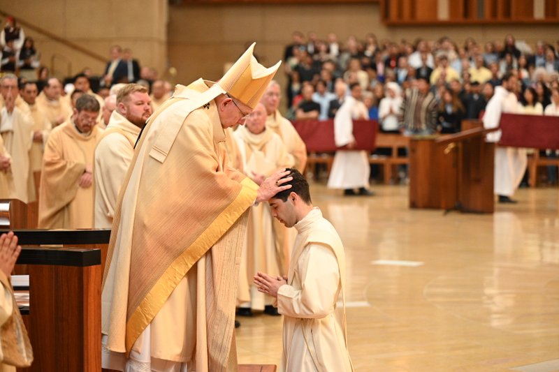 Archbishop Gomez blesses new LA priest Luis Gerardo Peña at the June 3, 2023, ordination Mass. (Archdiocese of Los Angeles)