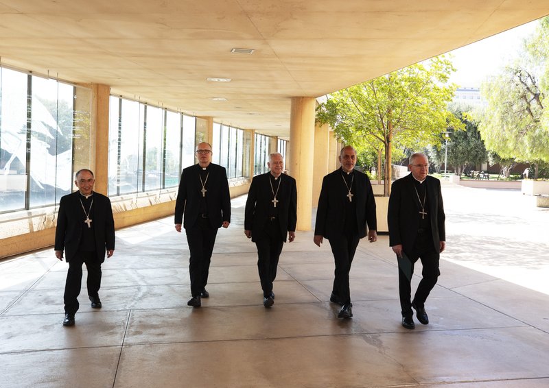 Archbishop José H. Gomez walks with LA’s newly appointed auxiliary bishops, Fathers Matthew Elshoff, OFM Cap., Brian Nunes, Albert Bahhuth and Slawomir Szkredka. (Isabel Cacho)