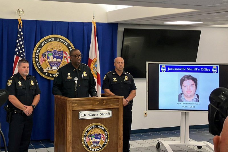 A photograph of Ryan Christopher Palmeter, 21, is shown at a news conference in Jacksonville, Fla., Aug. 27, 2023, after being identified by Sheriff T.K. Waters as the white man who killed three Black people before shooting himself at a Dollar General store Aug. 26, in what local law enforcement described as a racially motivated crime. (OSV News/Jacksonville Sheriff’s Office handout via Reuters)