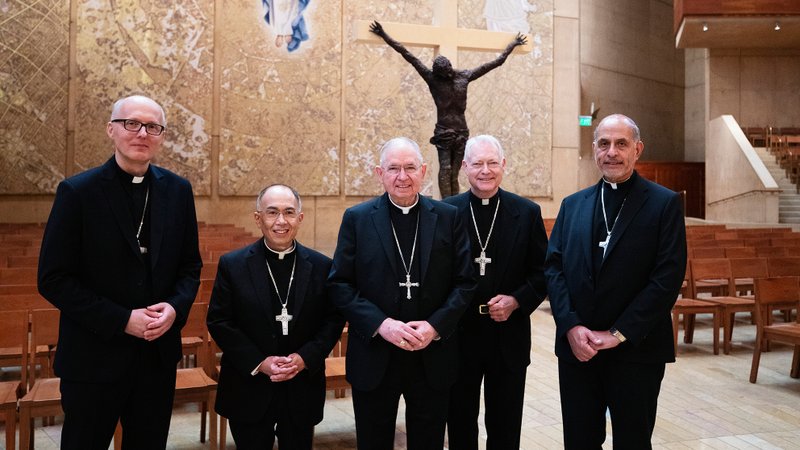 Los Angeles Archbishop José H. Gomez, center, poses with new LA auxiliary bishops appointed by Pope Francis (left to right): Father Slawomir Szkredka, Father Brian Nunes, Father Matthew Elshoff OFM, Cap., and Msgr. Albert Bahhuth. (Victor Alemán)