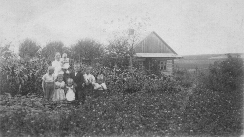 Wiktoria Ulma is pictured in an undated photo with three of her children and the children of relatives outside the Ulma home in Markowa, a village in southeastern Poland. Wikotria, her husband, Józef, and their seven children were executed March 24, 1944, by Nazis who discovered that the family had been sheltering eight Jews who had escaped internment by German occupying forces. Ulma girls Stasia and Basia are pictured in the middle near their mother, who is holding son Wlodzimierz. (CNS photo courtesy National Remembrance Institute)