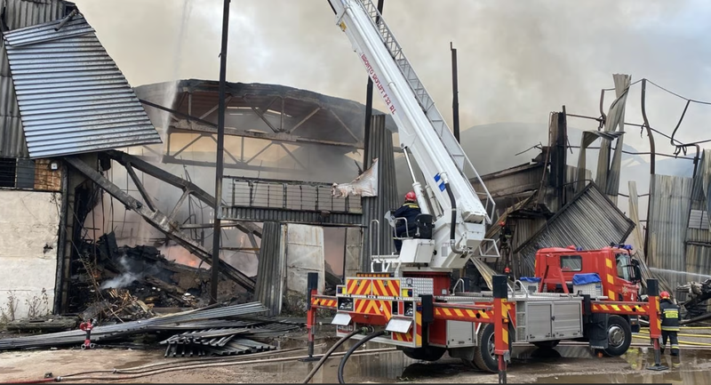 Fire trucks put out a blaze at the Caritas-Spes warehouse in Lviv, Ukraine on Sept. 19, 2023, after it was struck by a Russian missile attack. (Caritas Spes via Crux)