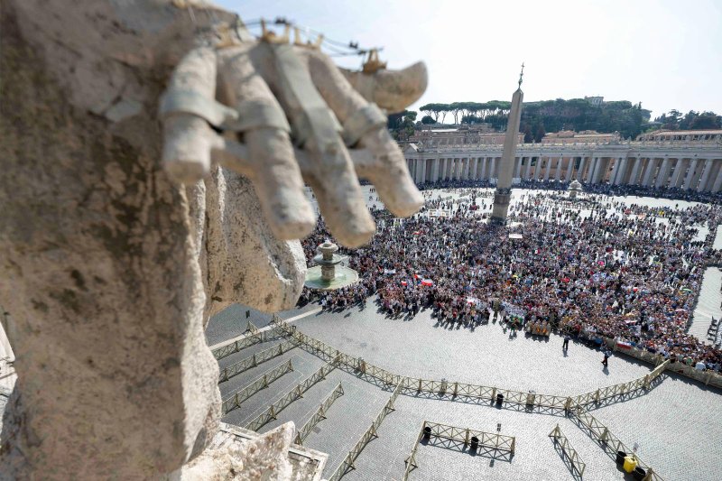 Visitors gather to pray the Angelus with Pope Francis in St. Peter's Square at the Vatican Oct. 1, 2023. (CNS/Vatican Media)