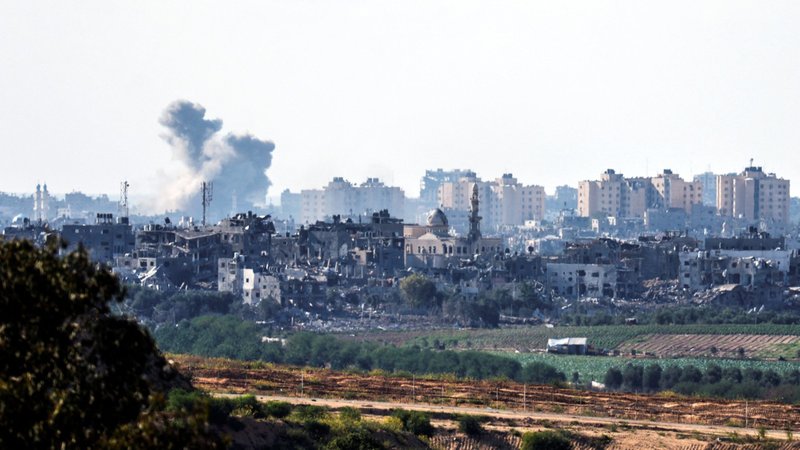 Smoke rises amid destroyed buildings in the Gaza Strip as seen from Israel's border with the Gaza Strip in southern Israel Oct. 18, 2023. (OSV News photo/Amir Cohen, Reuters)