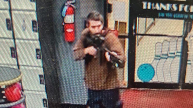 A still image from surveillance camera video shows a man with a gun, as the Androscoggin County Sheriff's Office appealed for information to identify a suspect in a mass shooting in Lewiston, Maine, Oct. 25, 2023. (OSV news/Androscoggin County Sheriff's Office/Handout via Reuters)