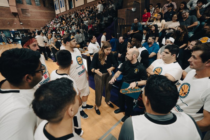 LA seminarians huddle up during a timeout during the Priests vs. Seminarians Basketball Game Oct. 13 at Cathedral High School. (Peter Lobato)