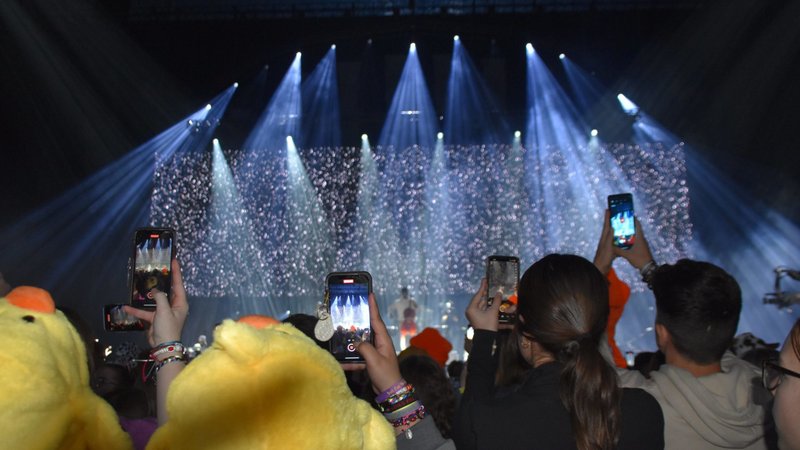 National Catholic Youth Conference participants hold up their phones to capture Christian rock band for KING + COUNTRY. (OSV News/Natalie Hoefer, The Criterion)