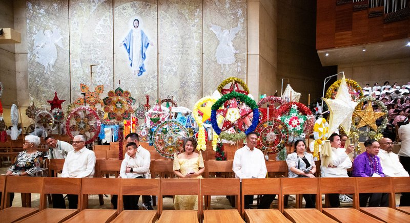 Filipino Catholics had a chance to inspect one another’s colorful ‘parols’ after the annual Simbang Gabi kickoff Mass Dec. 15 at the Cathedral of Our Lady of the Angels. (Victor Alemán)