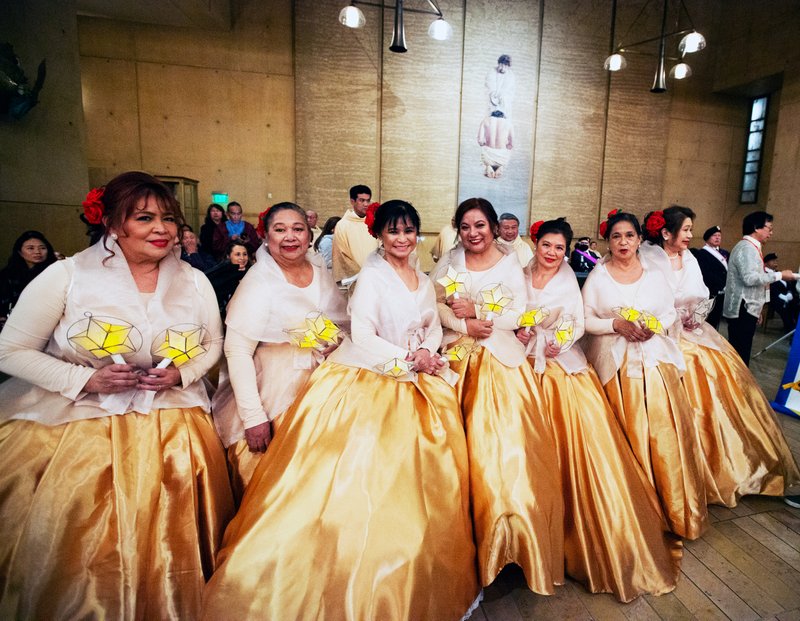 Dancers pose following the annual Simbang Gabi kickoff Mass Dec. 15 at the Cathedral of Our Lady of the Angels. (Victor Alemán)