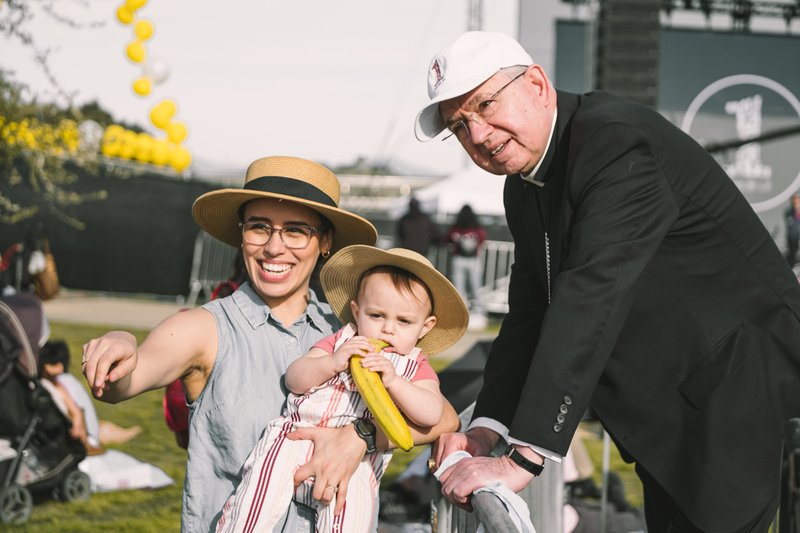 Archbishop Gomez greets a young Catholic and her mother at the 2020 OneLife LA event. (Archdiocese of Los Angeles)