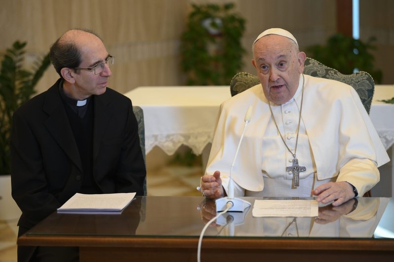 Pope Francis leads a livestreamed recitation of the Angelus last November with the help of Msgr. Paolo Braida, who read the pope’s commentary on the Sunday Gospel for him. Francis was suffering from a lung infection at the time. (CNS/Vatican Media)