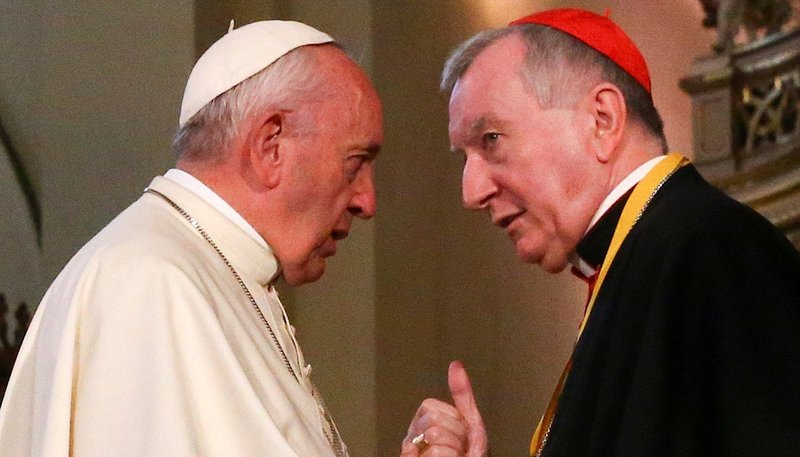 Pope Francis talks with Cardinal Pietro Parolin, Vatican secretary of state, at the cathedral in Lima, Peru, in this Aug. 30, 2018, file photo. (CNS/Alessandro Bianchi, Reuters)